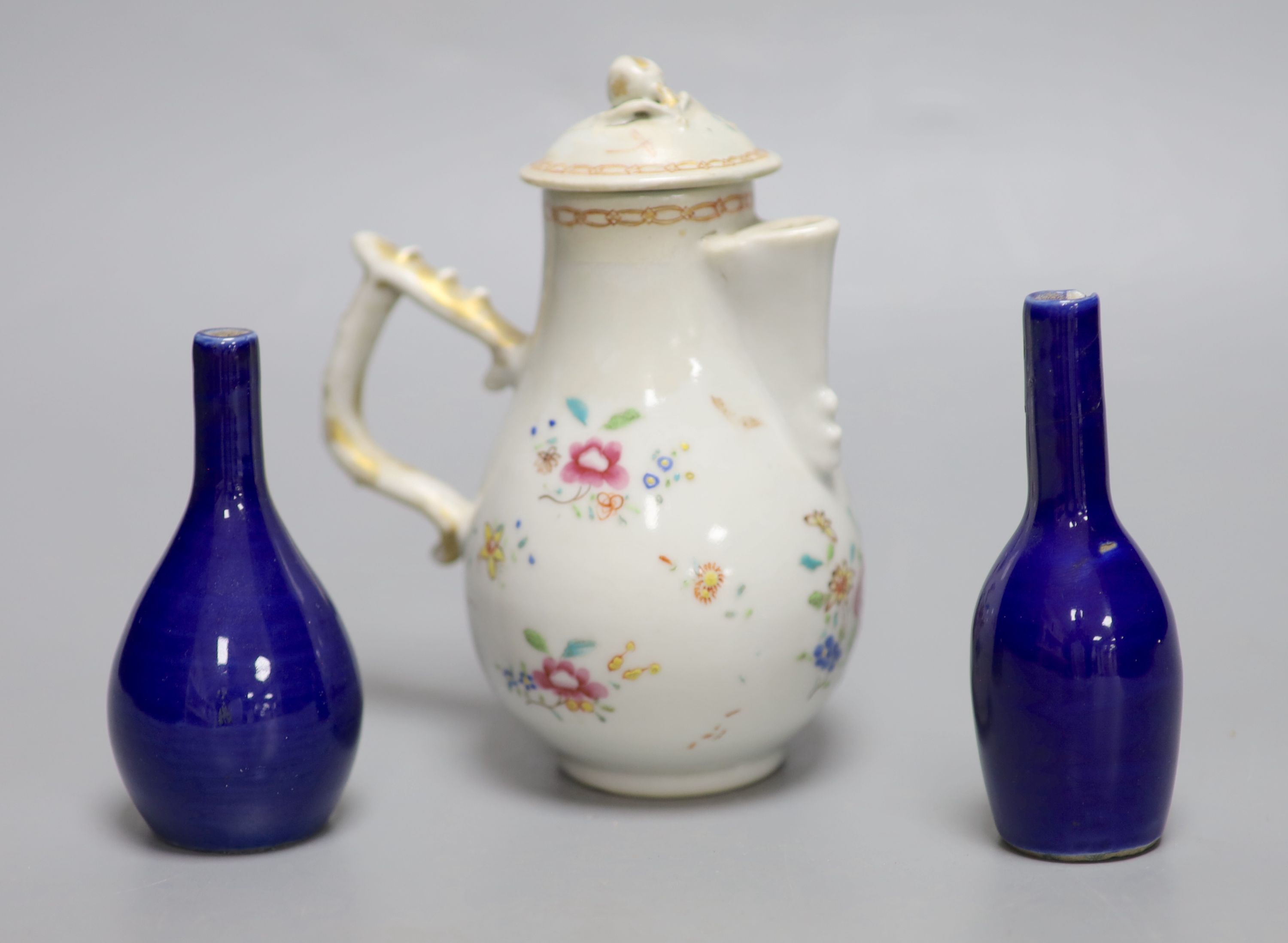 A Chinese famille rose porcelain sparrow beak jug, with cover (the latter a.f.) and a pair of small Chinese bottle vases (one chipped),